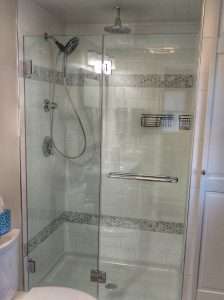 frameless shower door with chrome hardware
