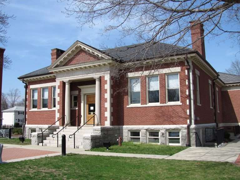 Historic red brick public library building exterior