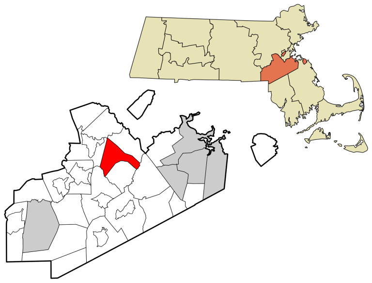 Map highlighting the location of Natick in Middlesex County, Massachusetts. The main map shows Middlesex County with Natick in red, while an inset shows the county’s location within Massachusetts, near towns like Westwood MA.