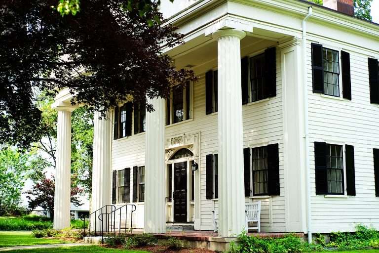 Historic white house with large columns