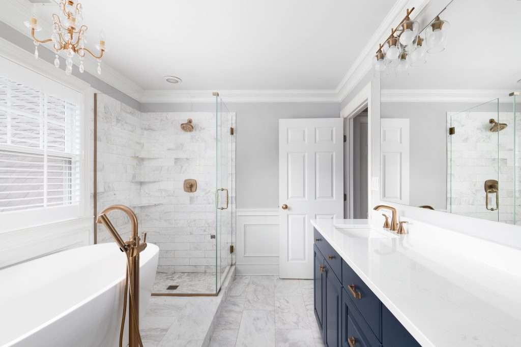 Modern bathroom with marble and gold fixtures