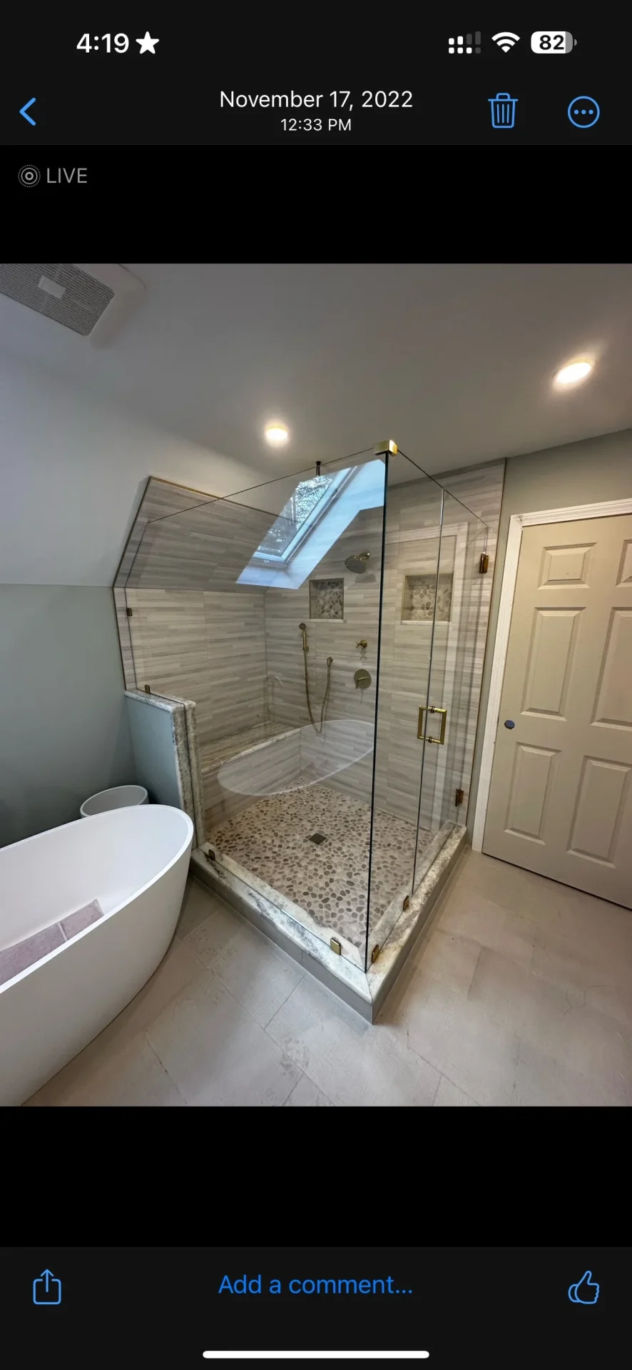custom frameless corner shower door gold hardware pebble tile Topsfield MA