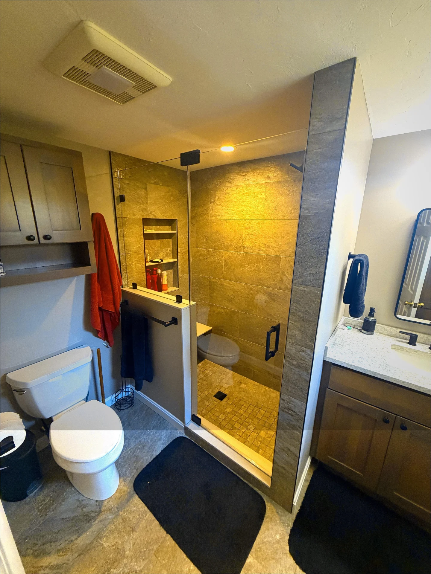 frameless hinged shower door matte black hardware slate tile Newburyport MA