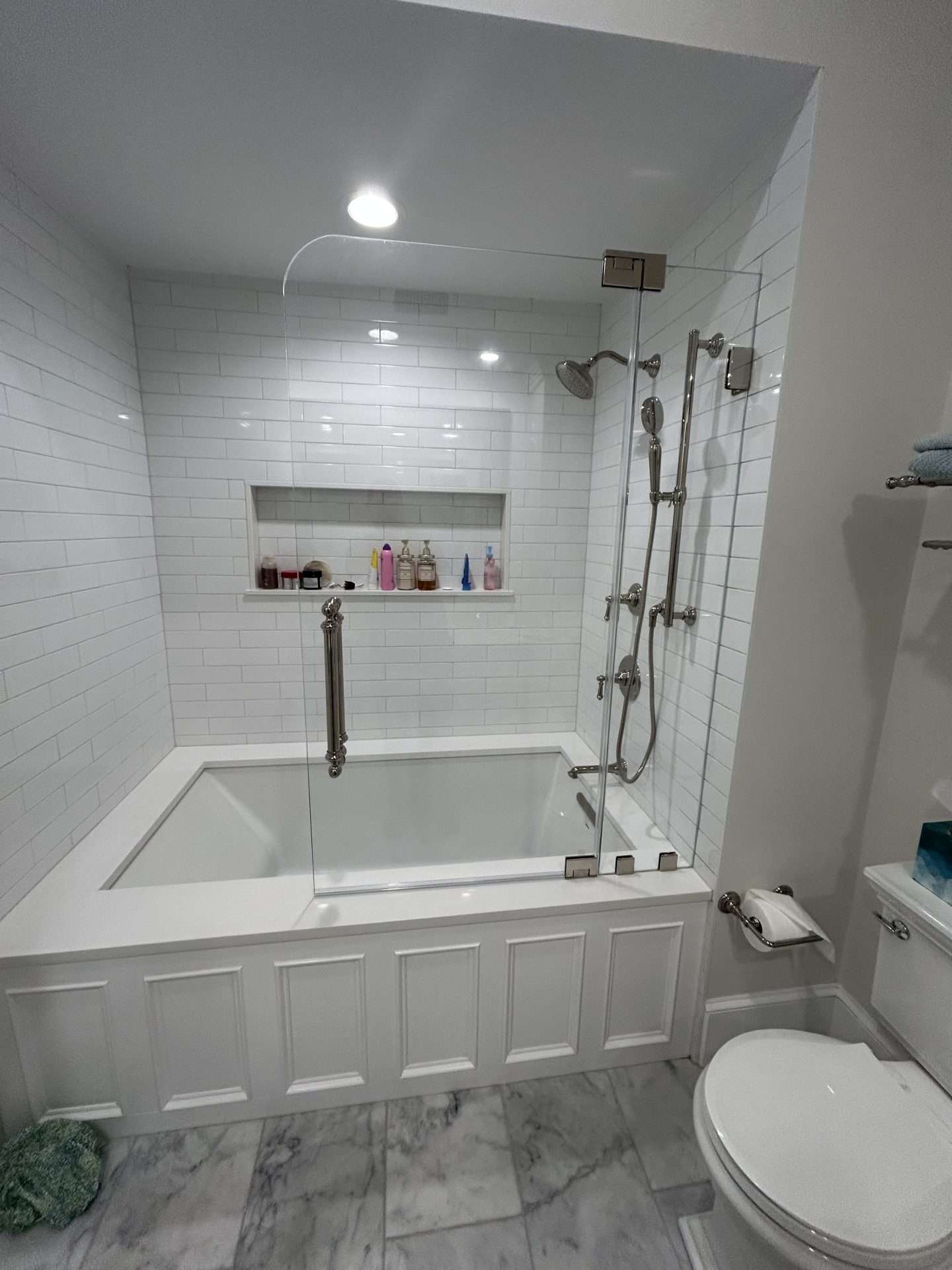Frameless glass shower door installation in North Shore, MA