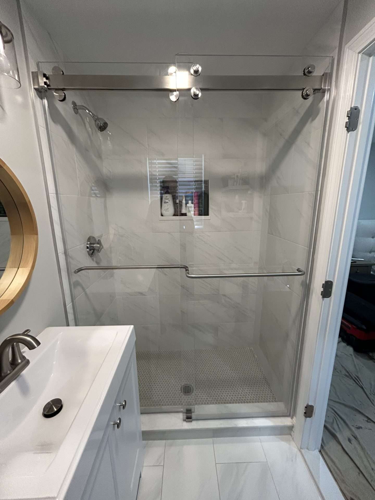 Frameless glass shower door installation in North Shore, MA