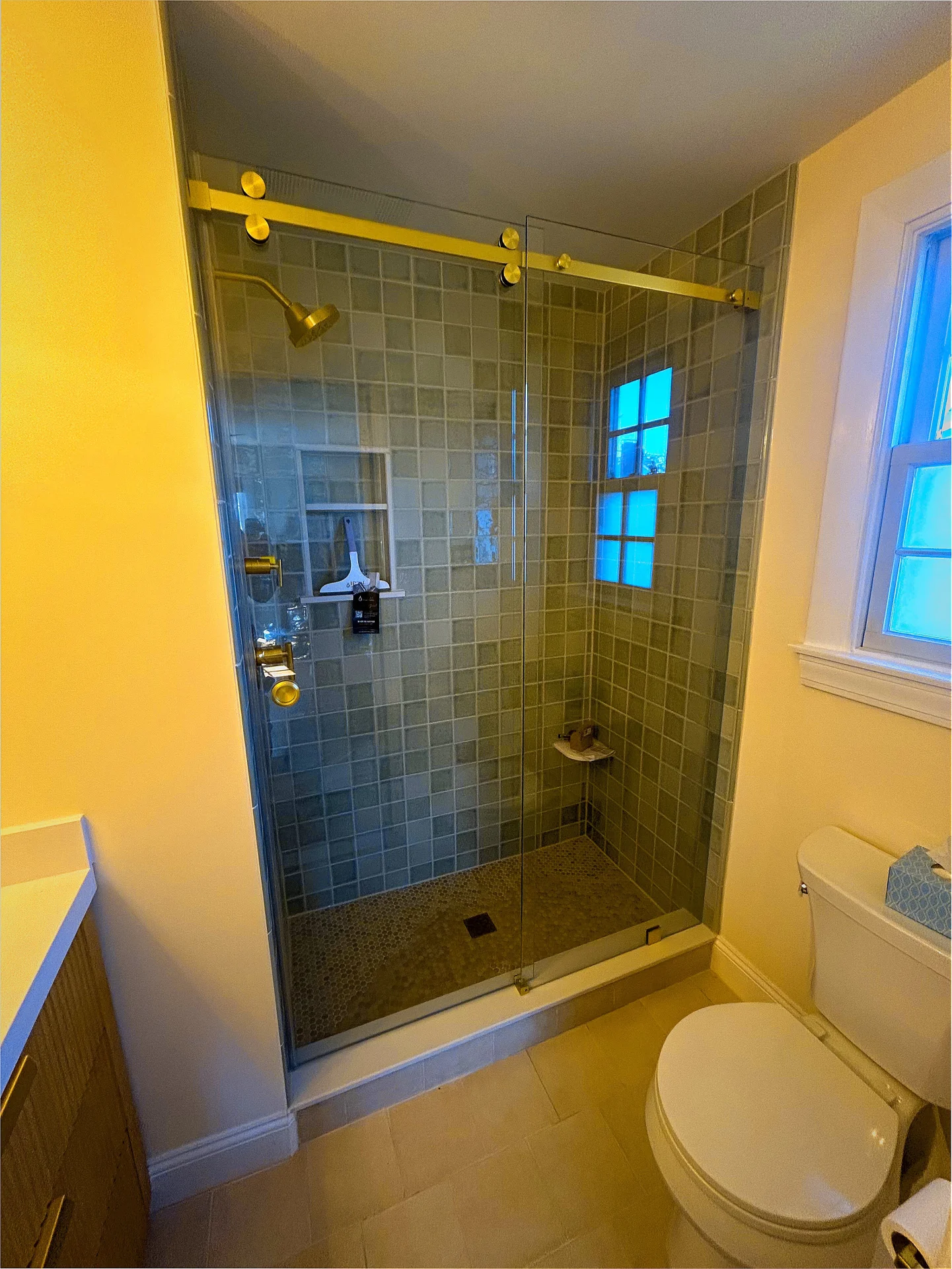 Frameless sliding door champagne gold hardware sage mosaic tile Marblehead MA