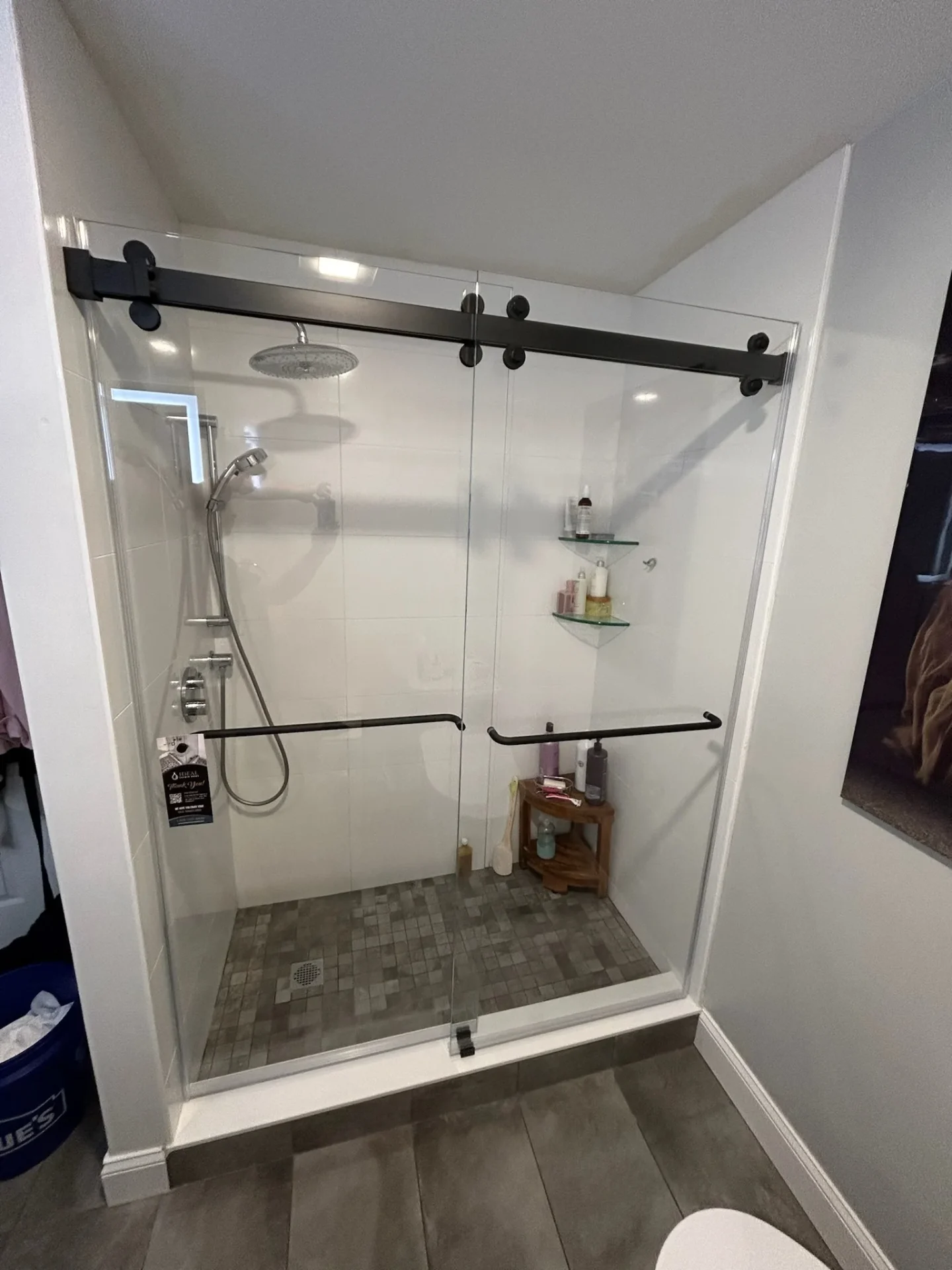 Sliding bypass shower door matte black white tile mosaic floor Burlington MA