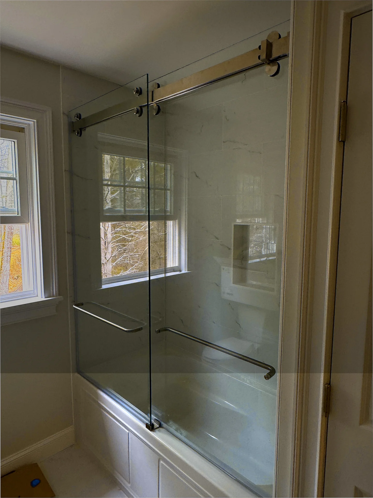 Sliding bypass frameless shower door brushed nickel marble tile Rowley MA