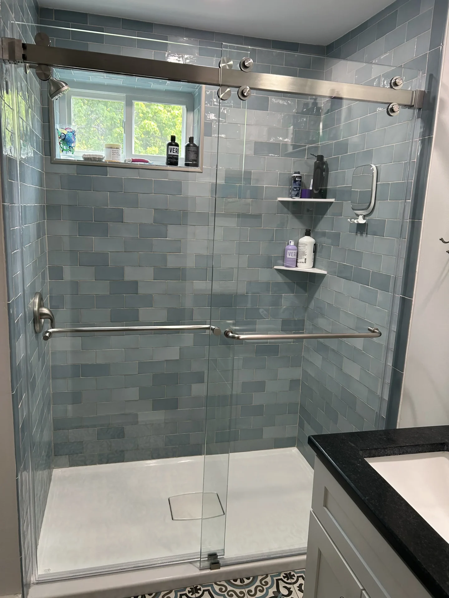 frameless brushed nickel bypass shower door blue grey subway tile encaustic floor Yarmouth ME