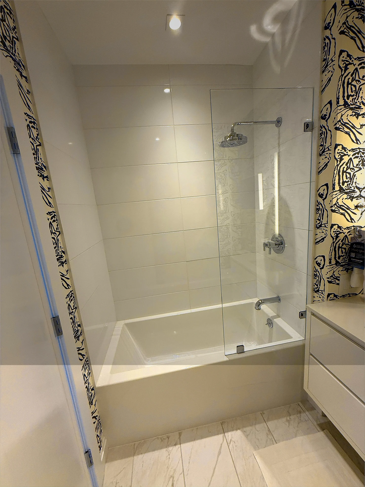 Frameless hinged bath panel polished chrome white tile Gloucester MA