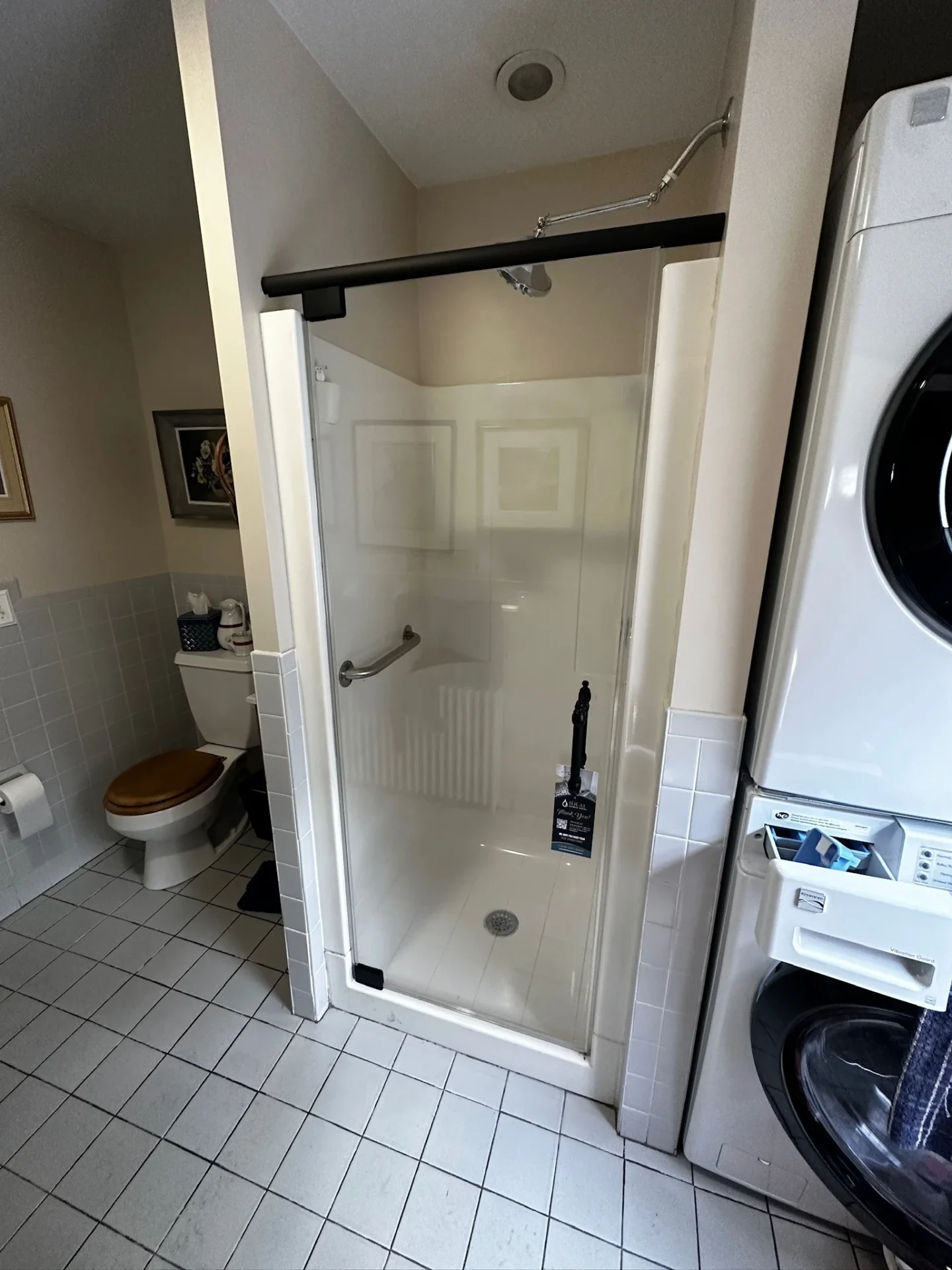 semi-frameless pivot door chrome black header white acrylic stall Quincy MA
