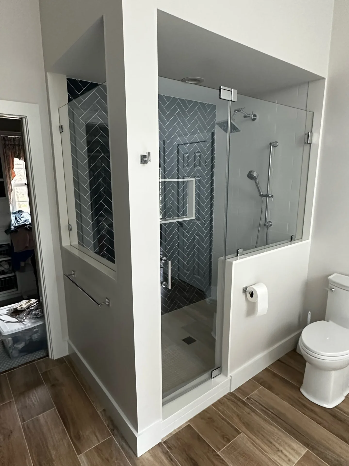 Frameless shower alcove chrome square pivot herringbone tile Boxford MA