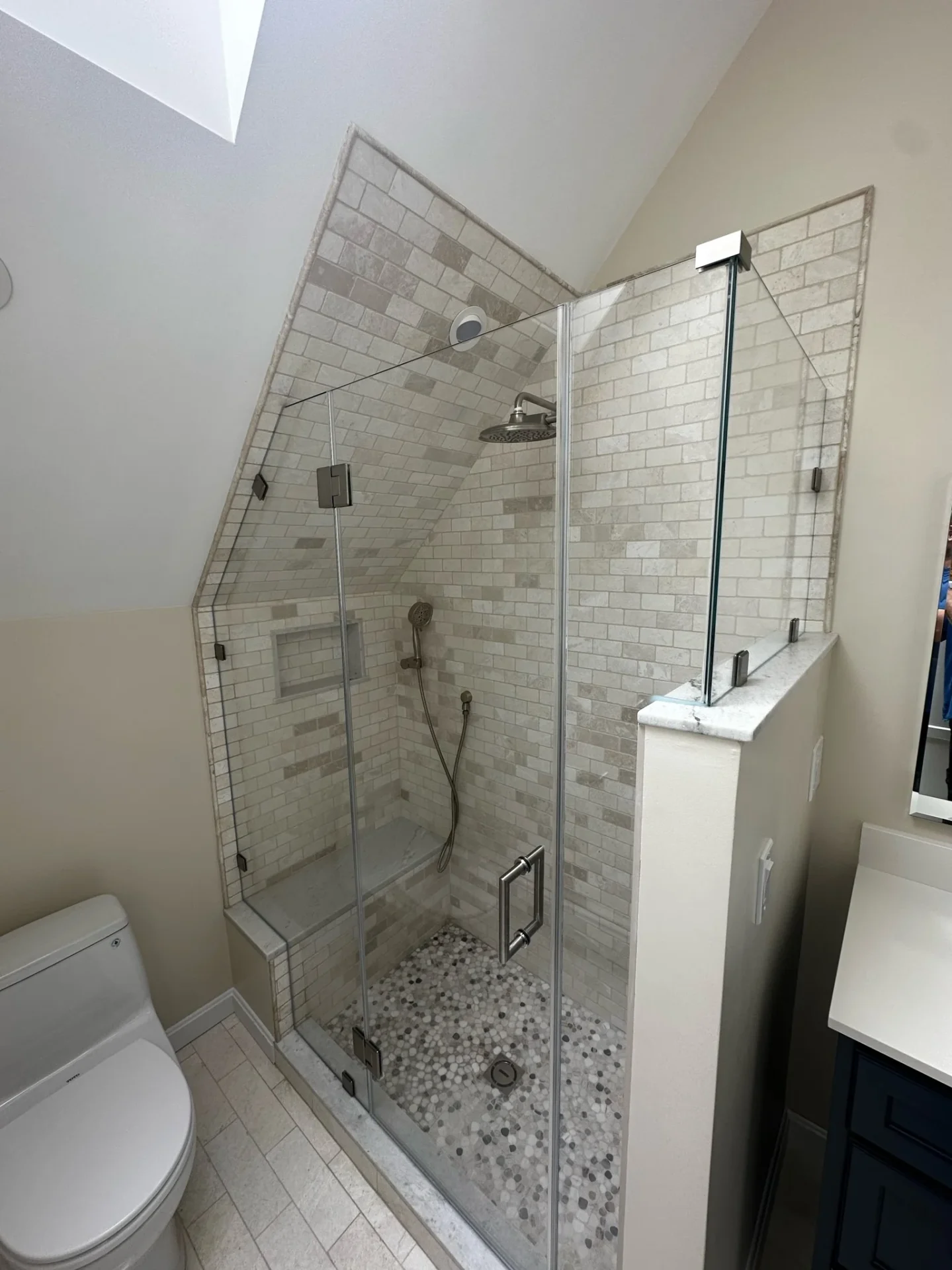 Custom frameless glass panels sloped ceiling brushed nickel pivot Marblehead MA