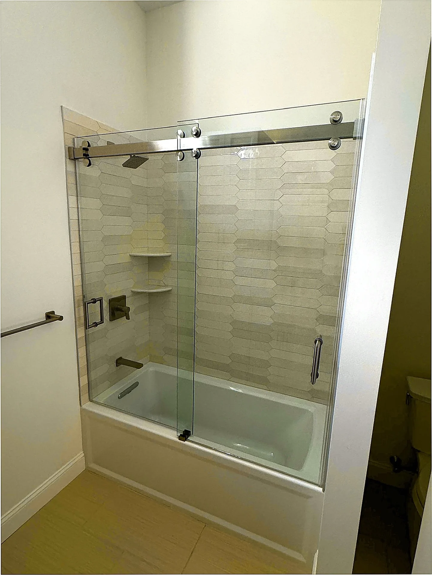 frameless sliding bypass tub door chrome rail picket tile Reading MA