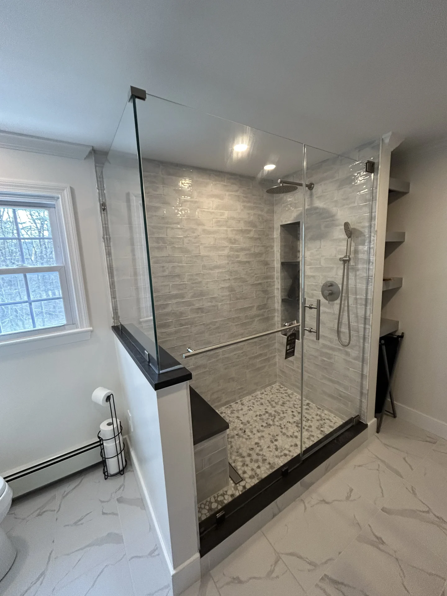 Frameless hinged shower door, chrome hardware, gray subway tile, Canton MA