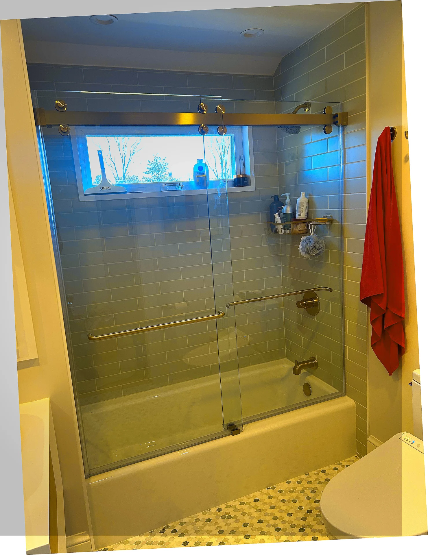 Sliding bypass tub door in champagne bronze, subway tile, Marblehead MA
