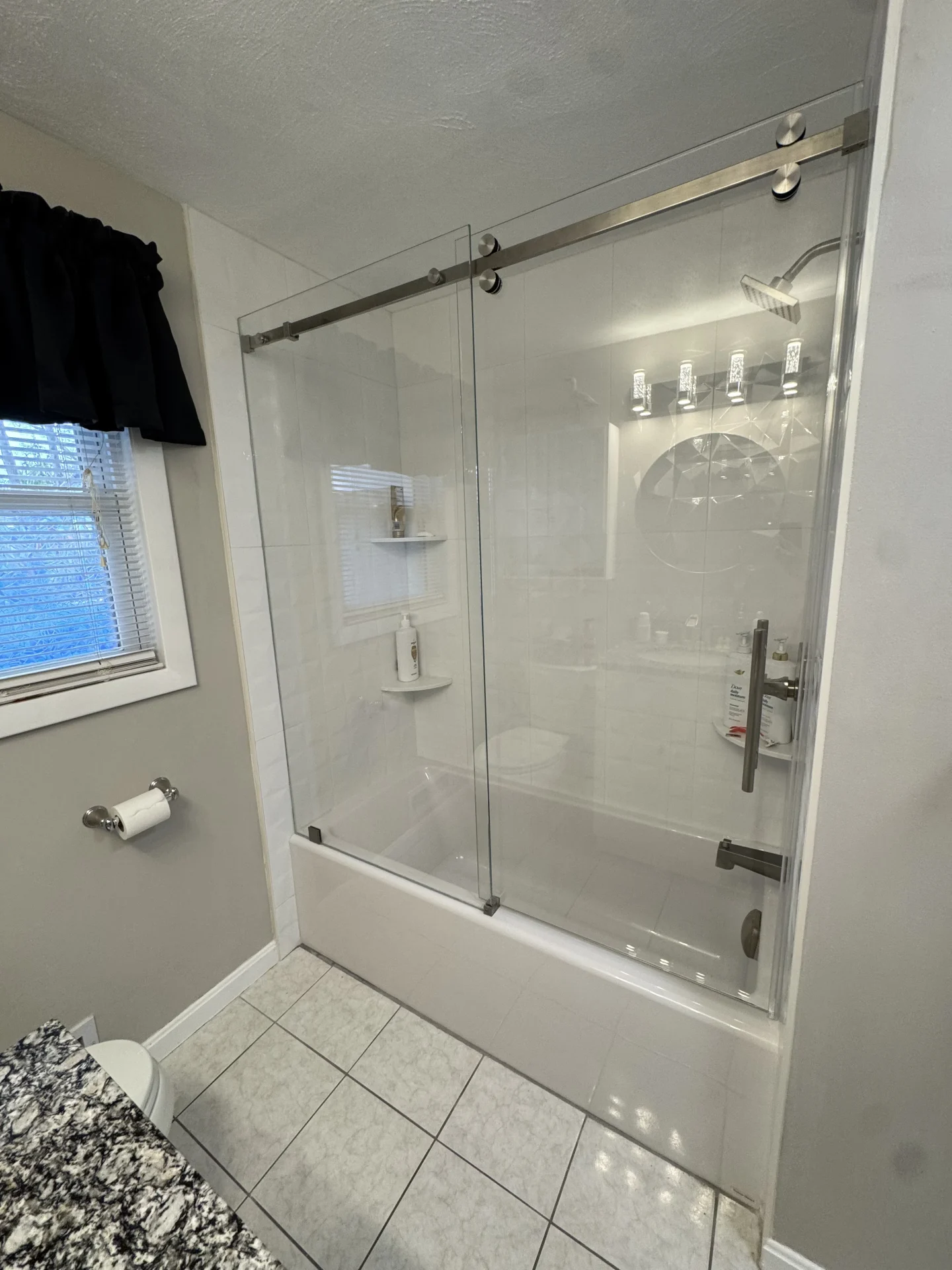 Sliding bypass tub door, brushed nickel hardware, subway tile, Peabody MA